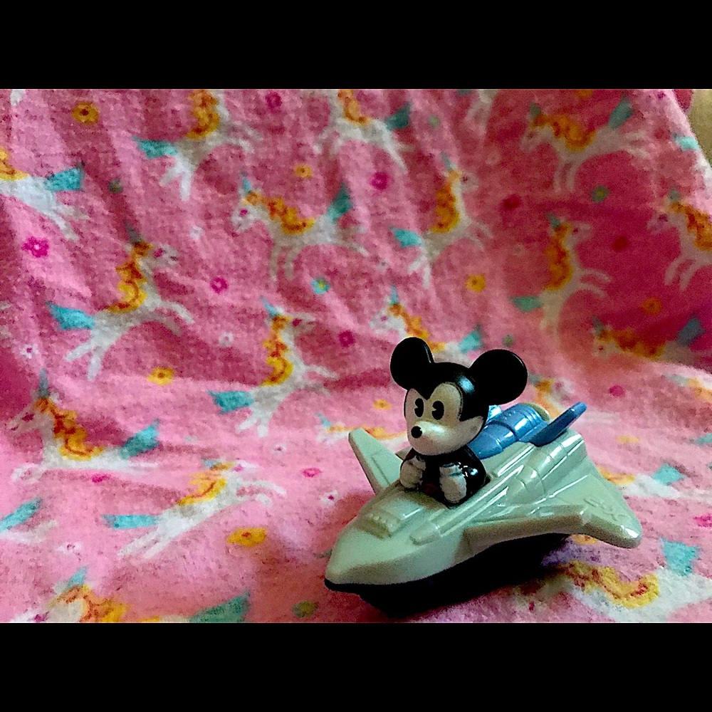 little kid mickey mouse in car